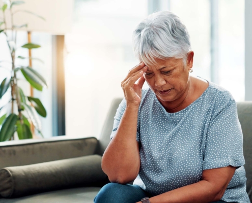 Elderly Person Struggling To Remember Things