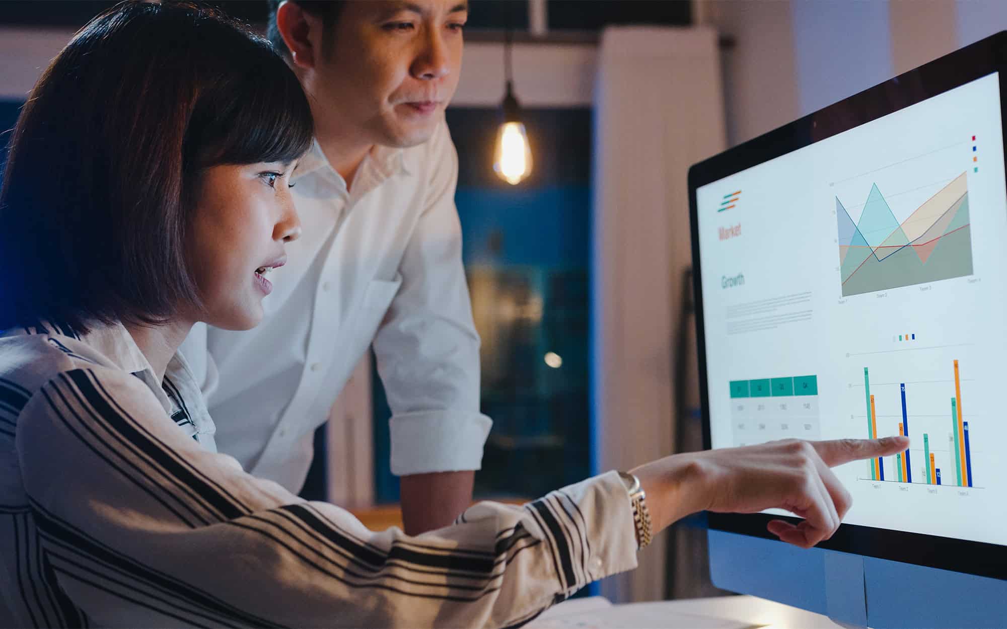 Businesswoman Using Computer Presentation